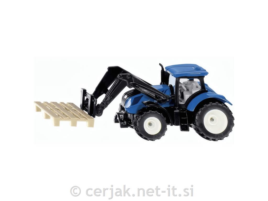 Traktor New Holland s sprednjim nakladalcem